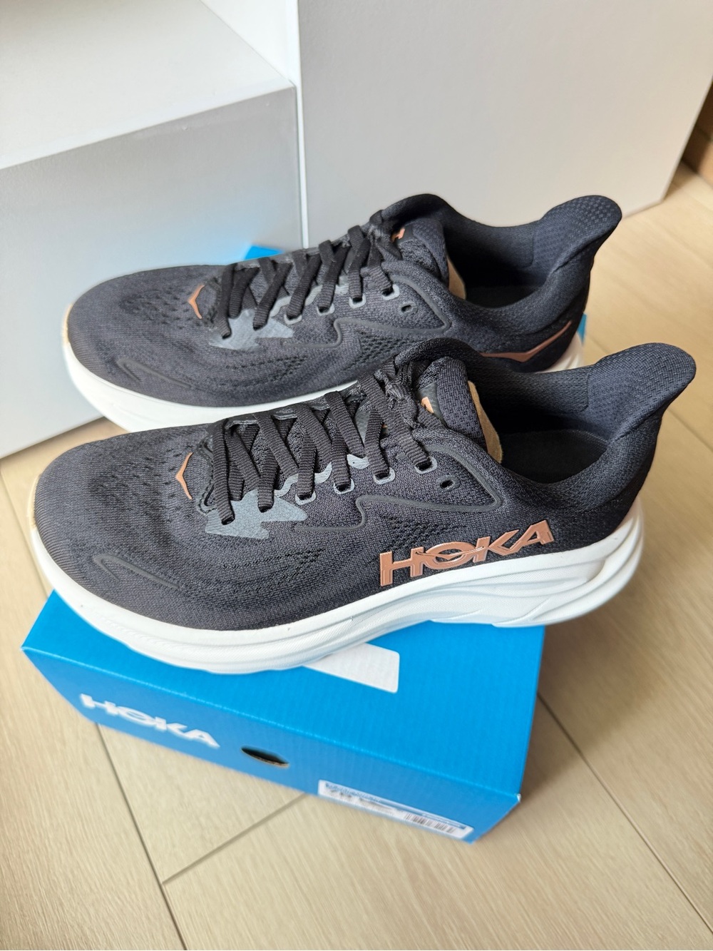 Brand New HOKA Women’s Clifton 10 Black Running Shoes with Rose Gold. Size 7B.